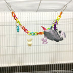 Juguete columpio para loros con puente colgante de cadena acrílica.