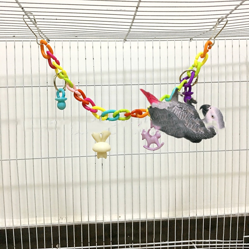 Juguete columpio para loros con puente colgante de cadena acrílica.